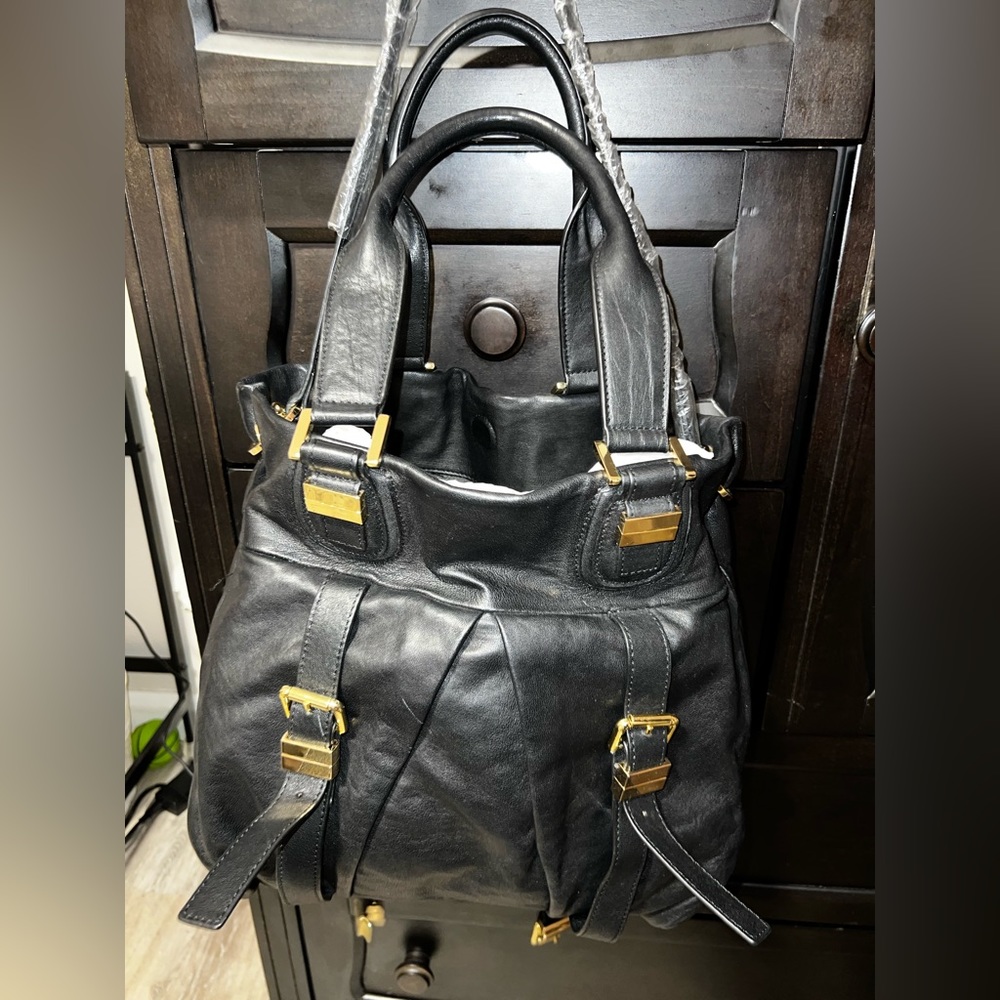 Joelle Hawkins Big black handbag